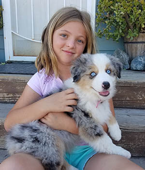 girl with puppy