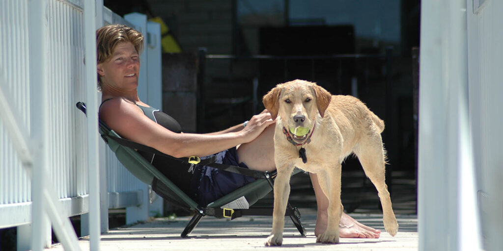 Dog and owner chilling at Clear Lake